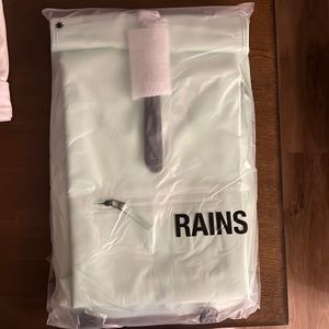 NWT Rains Rolltop Rucksack in Mineral / mint color $125 new in package!